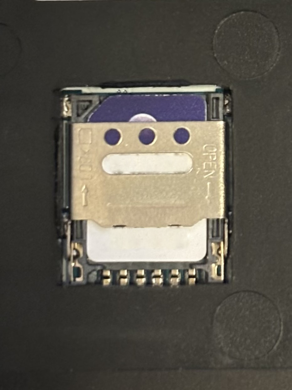 6. SIM tray, card locked (zoomed).png