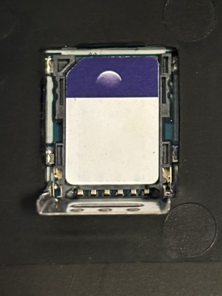 5. SIM tray, card placed (zoomed), edited.jpg